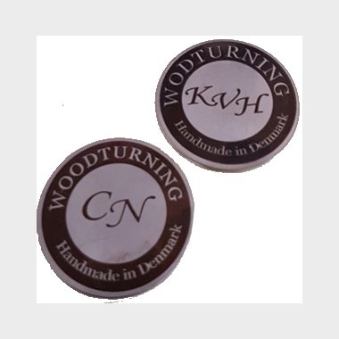 Trædrejning Rundel i rustfri stål. 10 stk. / med dit logo 20 mm, 25mm . 30mm